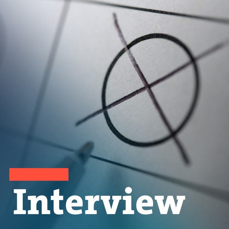 Ein Kreuz im Kreis auf einem Stimmzettel & Typo "Interview"