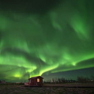 Grün leuchtende Polarlichter | So entstehen Polarlichter