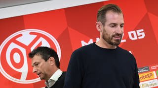 Jan Siewert (re.), Interimstrainer des 1. FSV Mainz 05, und Sportvorstand Christian Heidel