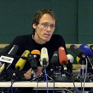 Dieter Baumann bei der Pressekonferenz im November 1999 am Olympiastützpunkt Stuttgart 