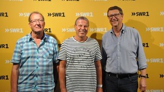 Die SWR1 Hitparaden-Macher Jürgen Rathfelder, Hans-Peter Archner und Christoph Mohr