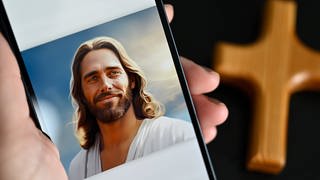 Die App Text with Jesus von der Tech-Firma Catloaf Software auf einem Smartphone 