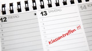 Tischkalender mit Eintrag Klassentreffen desk calendar in German with entry class reunion BLWS680161 
