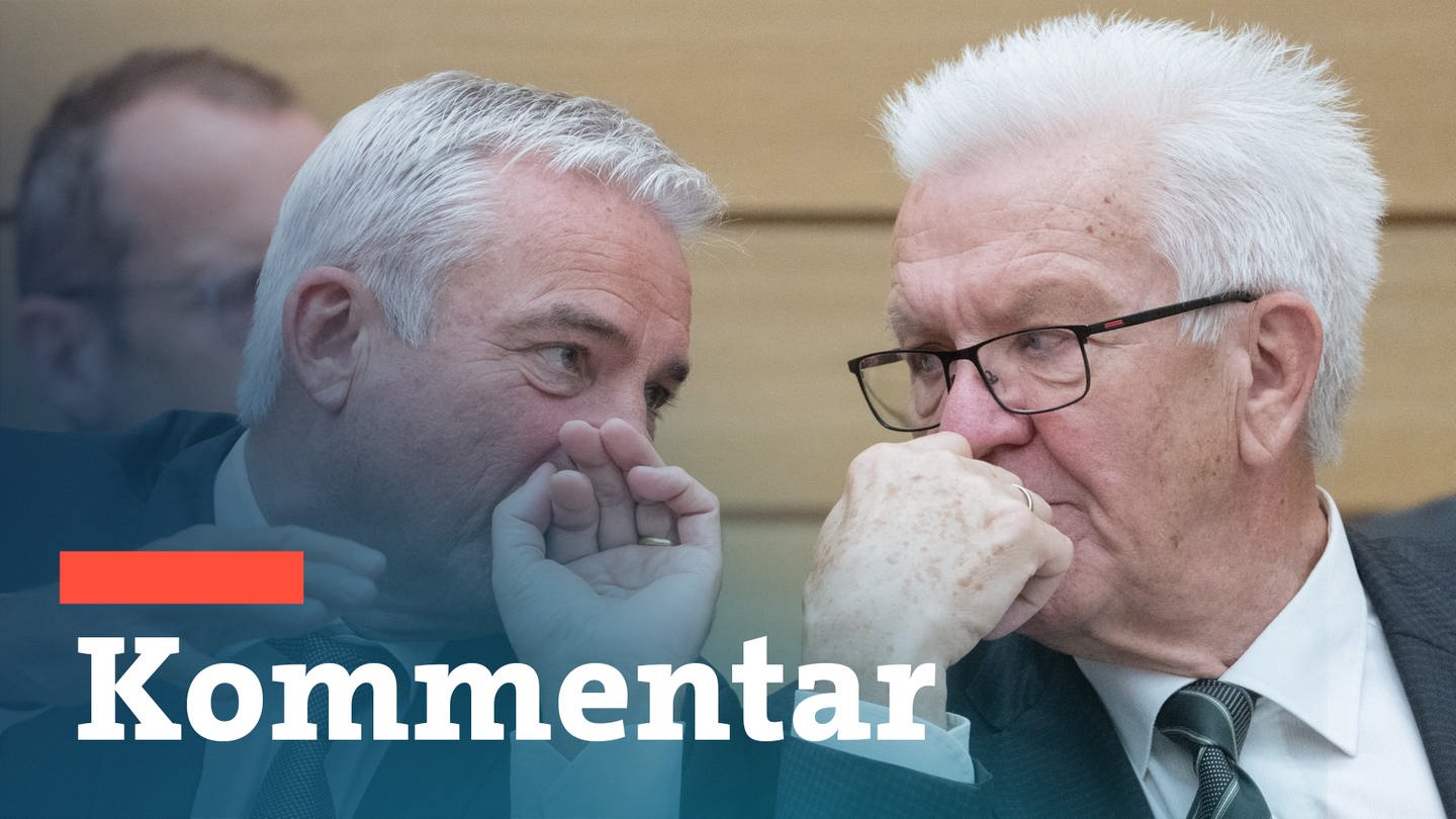 Schriftzug Kommentar zum BW-Trend, der Umfrage zur Landespolitik vor Thomas Strobl (CDU) und Winfried Kretschmann (Grüne)