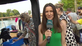 Isabel Heine berichtete in SWR Aktuell am Samstagabend live vom 24-Stunden-Flohmarkt.