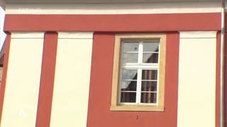 Einschussloch im Fenster