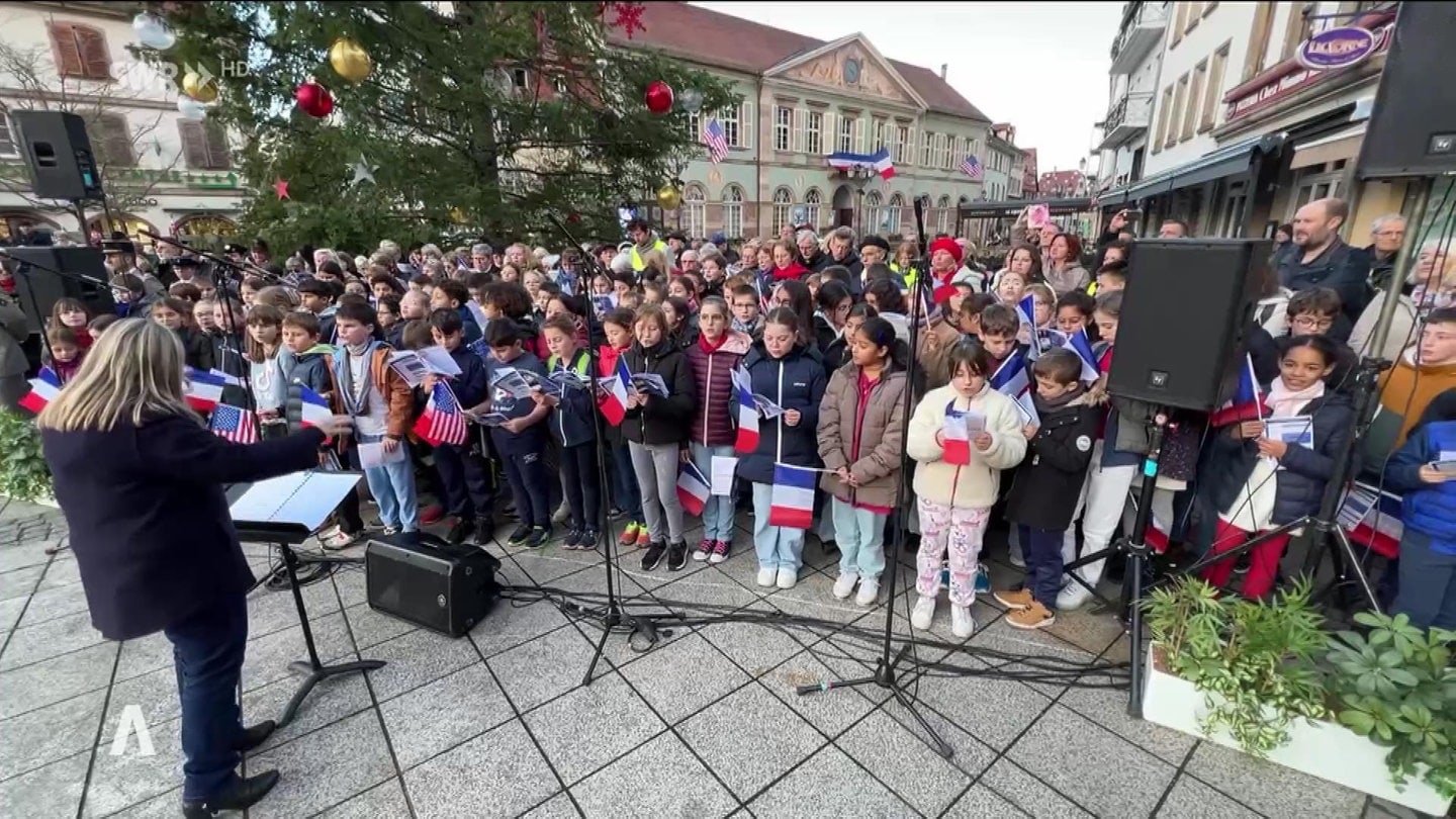 Kinder singen bei Befreiung  Mutzig und Molsheim