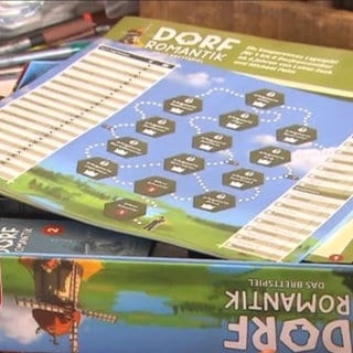 Michael Palm und sein Brettspiel "Dorfromantik" als Spiel des Jahres 2023