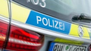 Polizeiauto. Heck mit grafischem Effekt. Symbolbild.