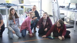 Mädchen beim Workshop der Auerbach Stiftung aus Bruchsal mit Volocopter