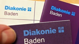 Lila Flyer der Diakonie Baden