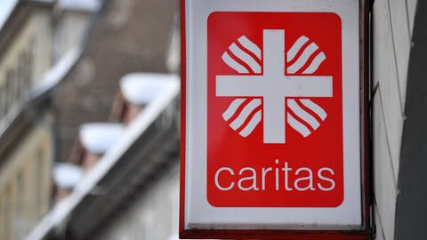 Rot-weisses Caritas Schild
