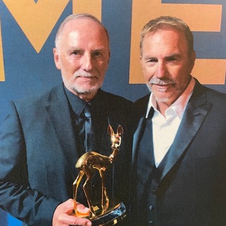 Manfred Gerl mit Hollywood-Star Kevin Costner