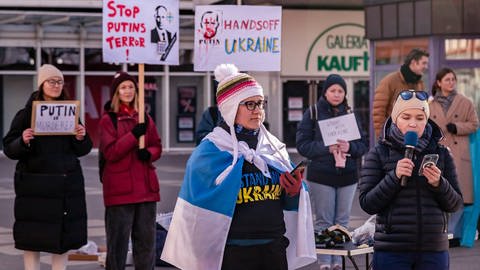 Aktivisten der Gruppe "Stop Dictators" bei Protesten