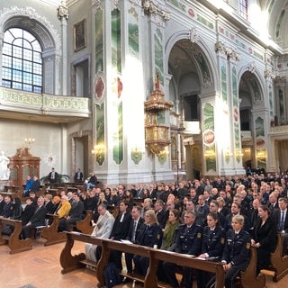 Gedenkfeier für im Dienst getötete Polizisten in der Jesuitenkirche in Mannheim