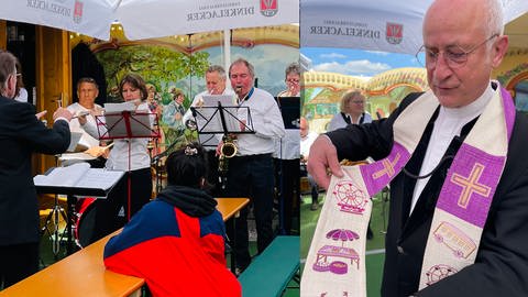 Pfarrer feiert mit Schaustellern in Festzelt auf dem Wasen einen Gottesdienst