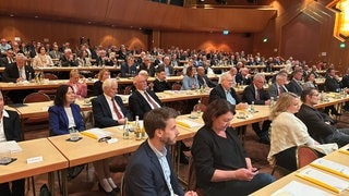 Landräte diskutieren in Bruchsal auf der 42. Landkreisversammlung