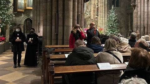 Nach der Christmette auch in der Silvestermesse: Erneuter Proteste gegen die Kündigung des Freiburger Domkapellmeisters Boris Böhmann.