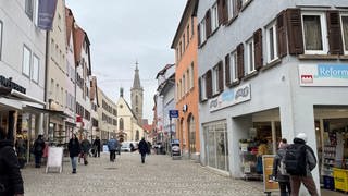 Menschen und Geschäfte in der Rottenburger Innenstadt