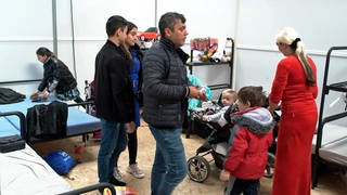 Flüchtlinge in den Messehallen: Der Oberbürgermeister in Ulm stoppt vorübergehend die Aufnahme von Geflüchteten.