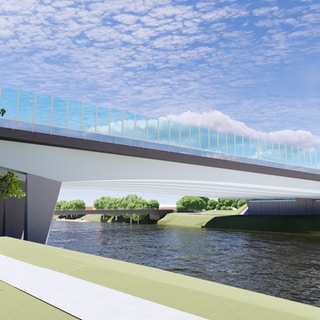 Eine helle Betonbrücke mit einer gläsernen Lärmschutzwand führt über einen Fluss. So soll die Adenauerbrücke über die Donau zwischen Ulm und Neu-Ulm in Zukunft aussehen (Archivbild). 