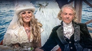 Uli Trompetter und Arno Filbig im Studio der SWR Landesschau. Die Hochzeit der beiden war umrahmt von Pleiten, Pech und Pannen.