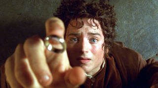 Hobbit Frodo greift nach dem Ring