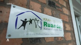Schild mit der Aufschrift: Krankenhaus Ruanda