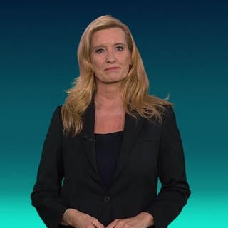 Moderatorin Claudia Kleinert