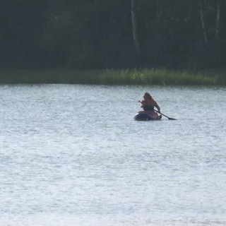 Frau auf Kayak