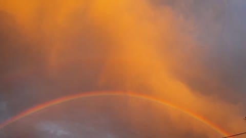 Regenbogen beim Sonnenuntergang