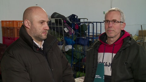 Michael Rosher (links) und Vorstandsmitglied Dirk Stelzer vom Verein "Nicht reden.Machen!" in Bodenheim bei Mainz