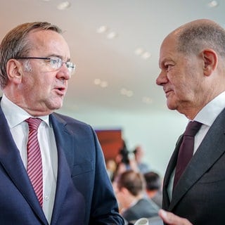 Wer wird Kanzlerkandidat der SPD? Olaf Scholz (r.) oder Boris Pistorius? Darüber gibt es auch in RLP Debatten.