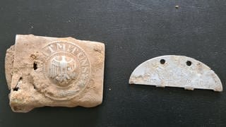 Bei den Leichen von vier Soldaten aus dem Zweiten Weltkrieg bei Neuwied wurden auch Teile einer Erkennungsmarke gefunden.