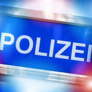 Polizei-Schild mit Blaulicht