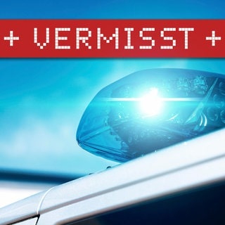 Polizeiauto mit Vermisst-Banner