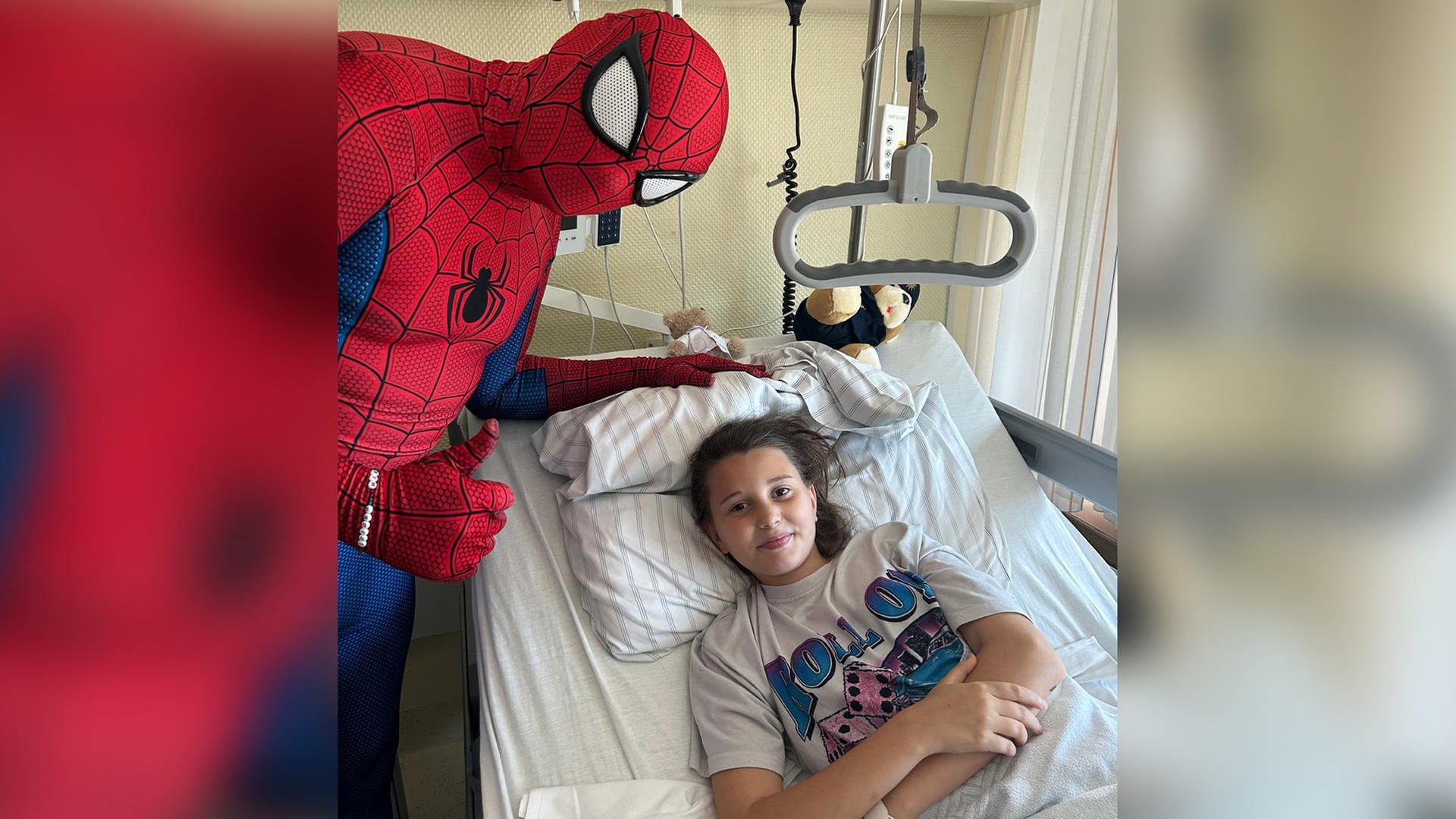 Spiderman besucht das verletzte Mädchen vom Brezelfest