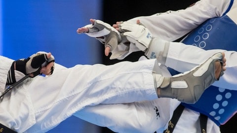 Bei der Sportart Taekwondo kommt es zu engem Körperkontakt.