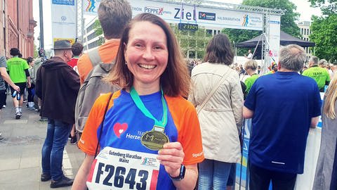 Natascha aus der Ukraine ist in Mainz beim Gutenberg-Marathon ihren ersten Halbmarathon gelaufen.