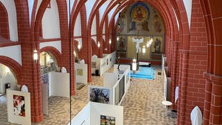 So hat bislang niemand die Gangolfkirche gesehen: Eine Kunstausstellung findet vom 18. November bis 11. Dezember in der Markt- und Bürgerkirche statt