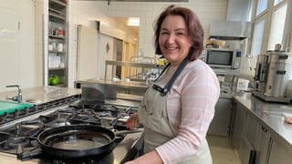Maiia Kibalnichenko ist aus der Ukraine nach Trier geflüchtet. Hier hat sie Arbeit in der Küche des Hotels Vienna House easy gefunden. 