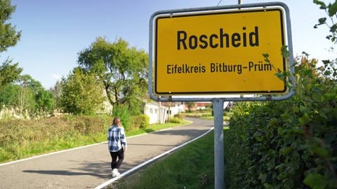 Das Ortsschild von Roscheid in der Westeifel.