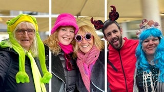 Narren bei der Karneval-Sessionseröffnung am Kornmarkt in Trier