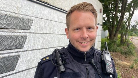 Matthias Emmerich, Leiter der Polizeiinspektion Trier, sorgt mit seinen Beamten für die Sicherheit der Familie Reinhardt. 