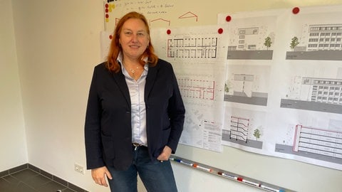 Sybille Jeschonek plant mit weiteren Gesellschaftern eine soziales Wohnquartier in Trier-West. Die Pläne des Landes könnten dieses Projekt allerdings gefährden.