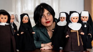 Nonnen als Puppen