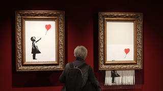 Bild von Bansky - Girl with Balloon - einmal komplett und einmal geschreddert