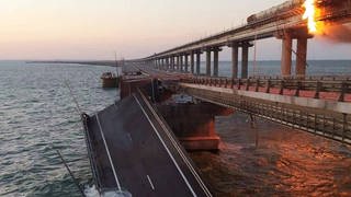 OCTOBER 8, 2022. Collapsed section of a bridge linking Crimea to mainland Russia.