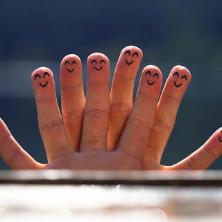 Happy group of finger smileys on the beach 5 model released