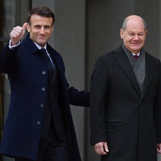 Der französische Präsident Macron und Bundeskanzler Olaf Scholz